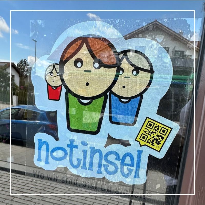 Schild "Notinsel" an Ladentür